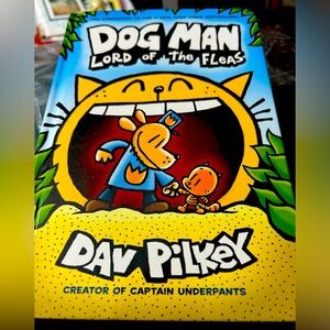 NWOT Never Read. Hardcover book.Dog Man Lord of the Fleas by Dav Pilkey.